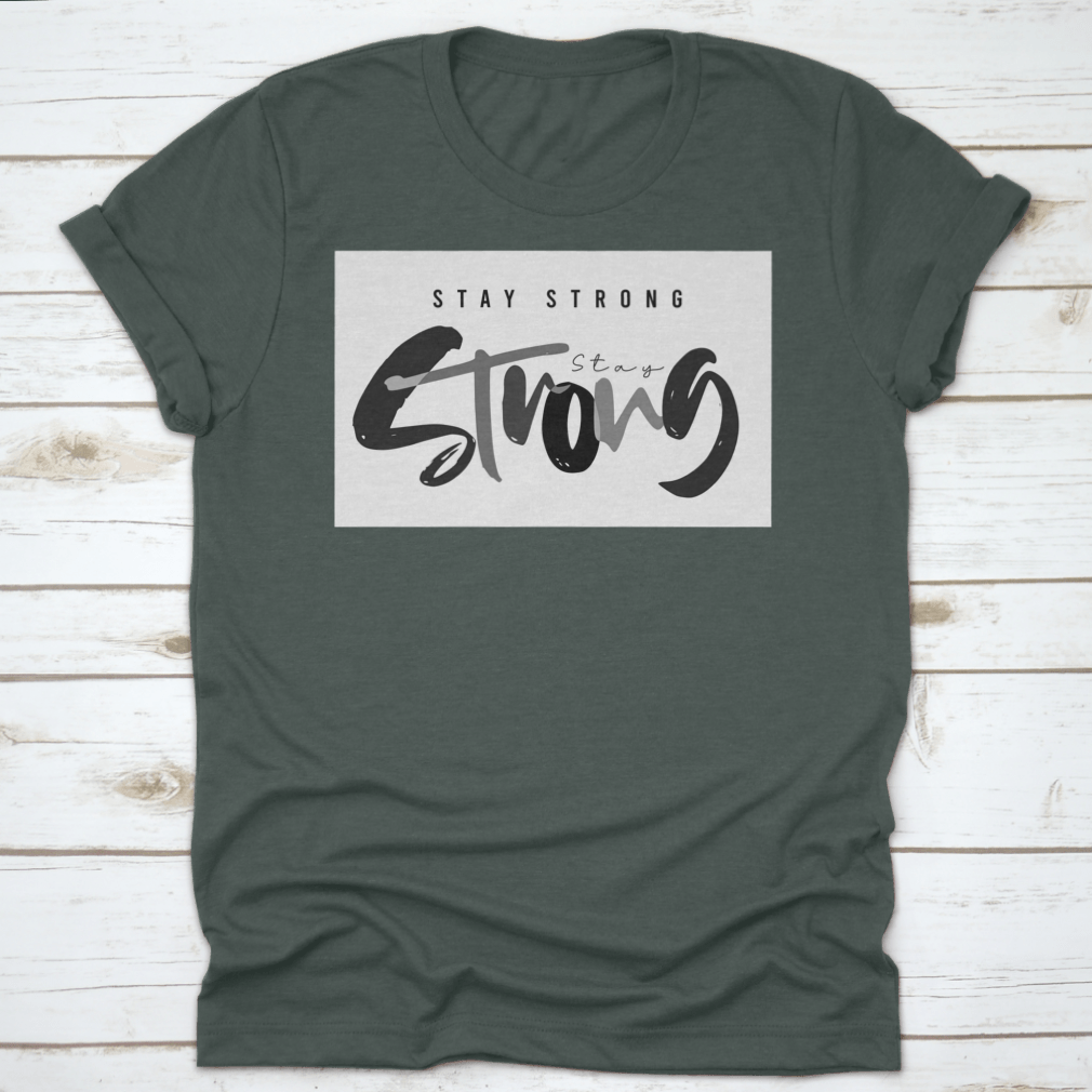 Stay Strong Typography Design T-Shirt in various colors, showcasing its comfortable fabric and classic fit.