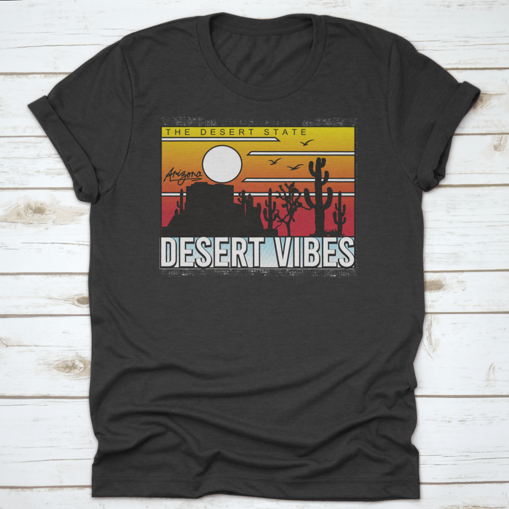 A stylish graphic tee featuring a vibrant cactus design inspired by Joshua Tree, showcasing desert vibes and artistic flair.