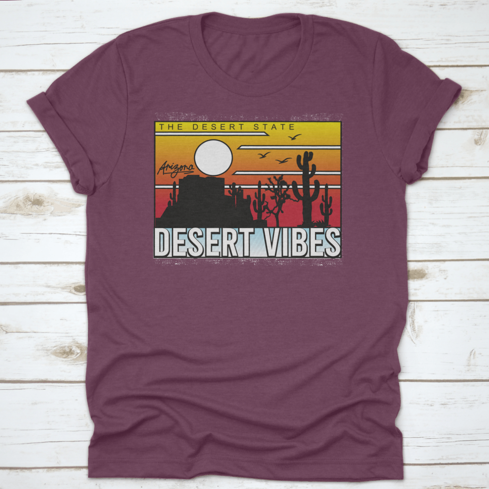 A stylish graphic tee featuring a vibrant cactus design inspired by Joshua Tree, showcasing desert vibes and artistic flair.