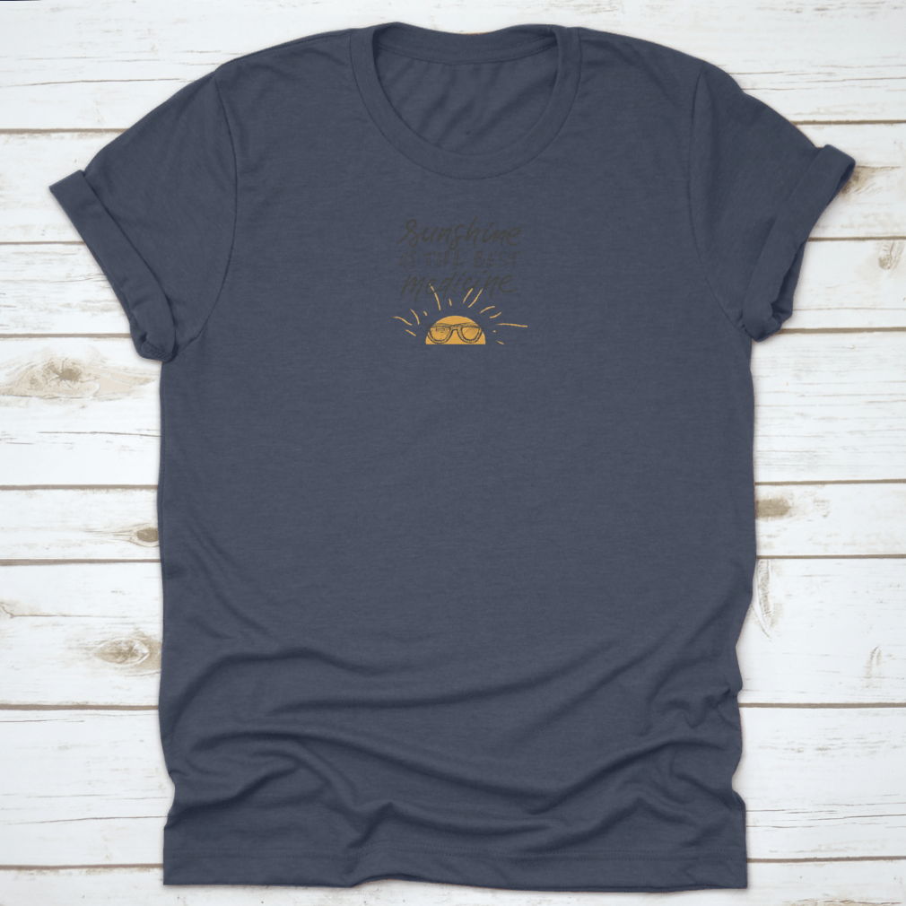 A stylish t-shirt featuring sunshine hand lettering quotes, showcasing a cheerful design on a soft fabric.
