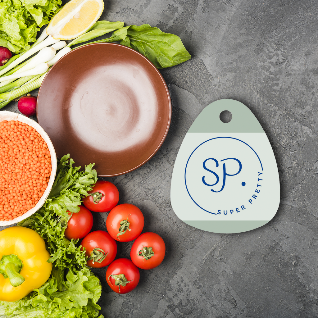 Super Pretty Sublimation Glass Cutting Board in a round shape with a water droplet design, featuring rubber feet for stability.