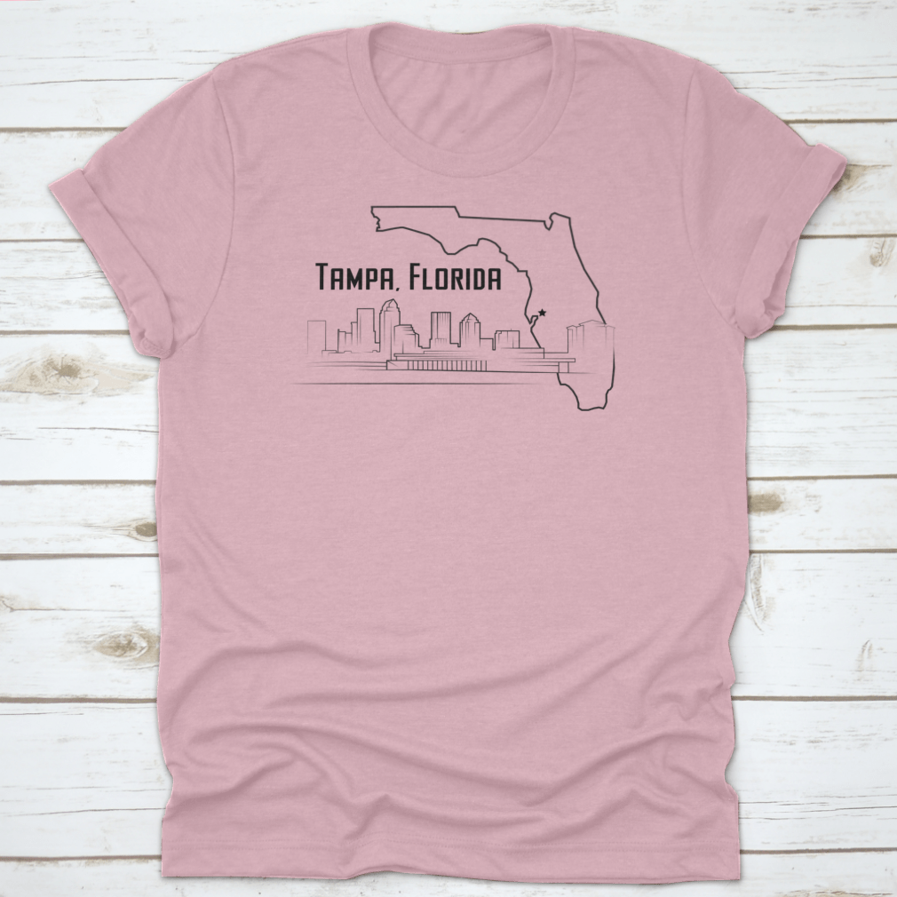 A stylish t-shirt featuring a sketch drawing of Tampa, Florida's city map and landmarks, showcasing its unique design.