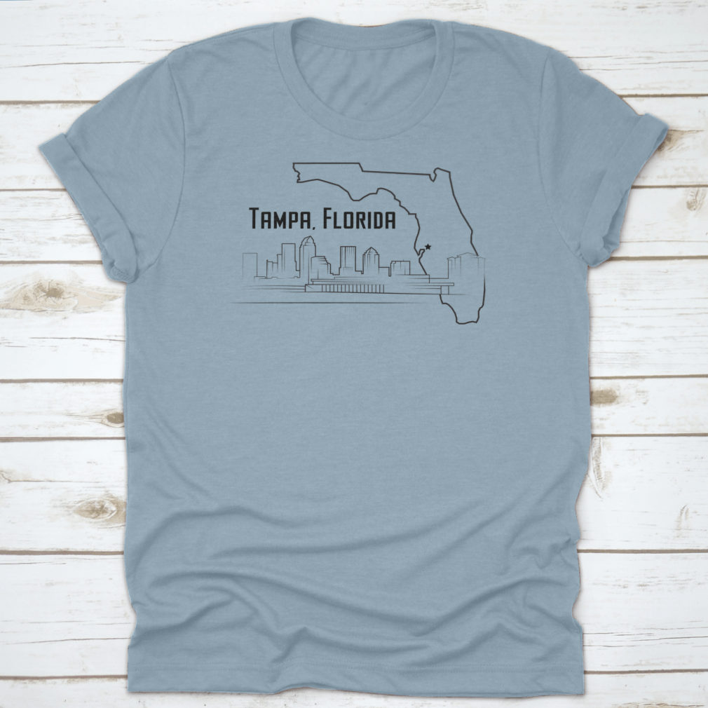 A stylish t-shirt featuring a sketch drawing of Tampa, Florida's city map and landmarks, showcasing its unique design.