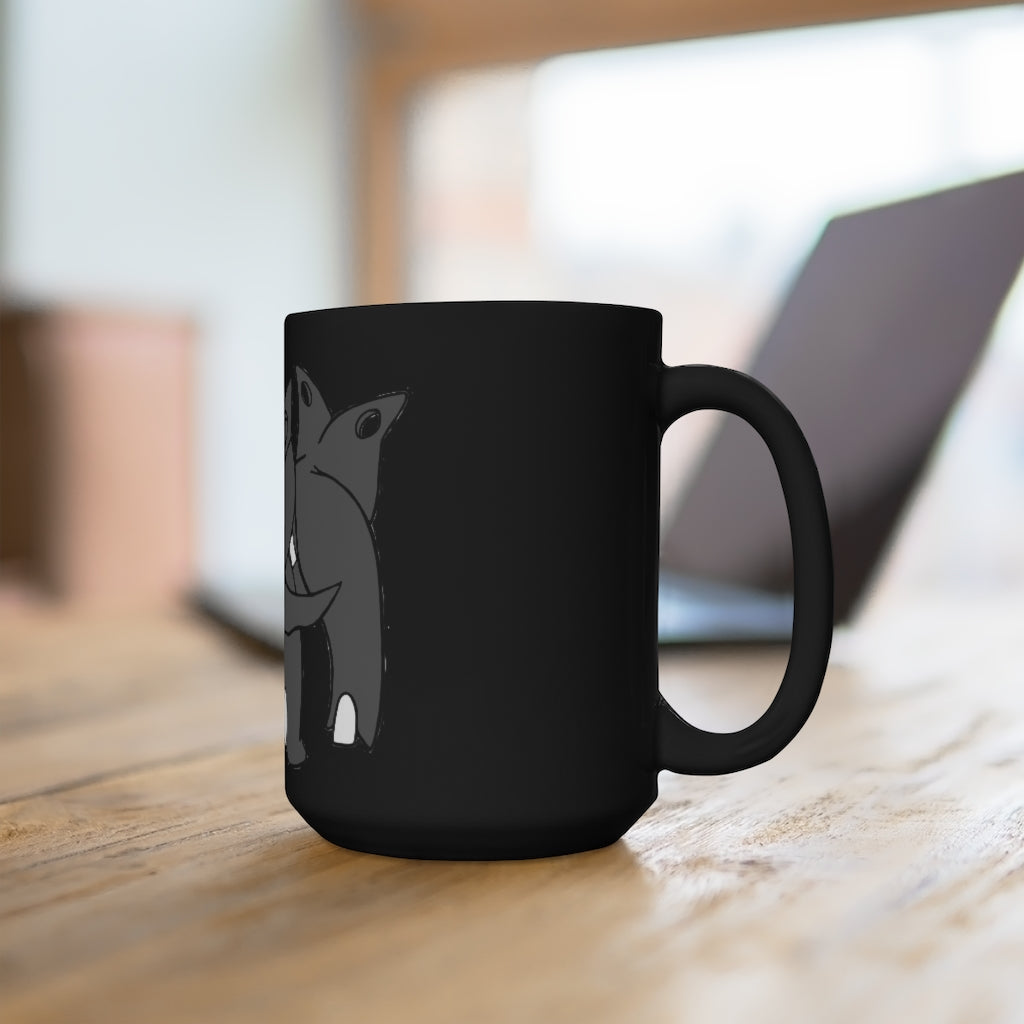 Tanktron Black Mug 15oz featuring a sleek black ceramic design with rounded corners and a comfortable C-handle.