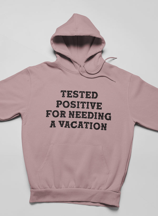 Cozy hoodie with the phrase 'Sick & Tired Of Homeschooling My Kids' printed on it, featuring an adjustable hood and banded cuffs.
