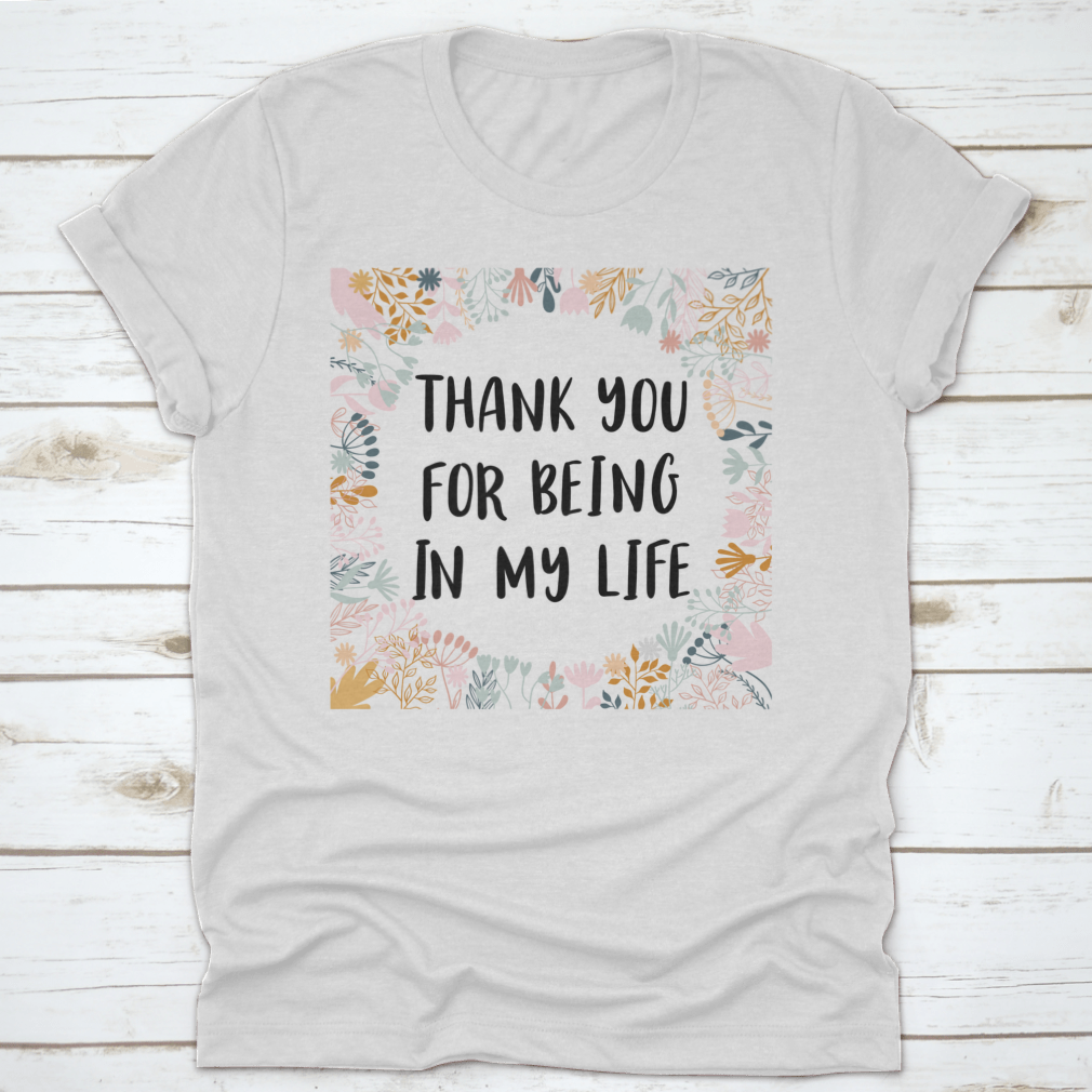White t-shirt with gratitude message.