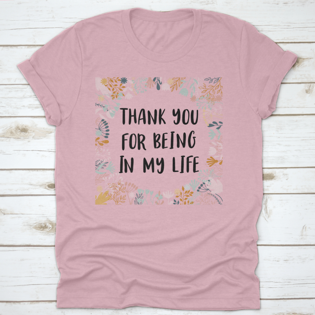 Pink t-shirt with gratitude message.