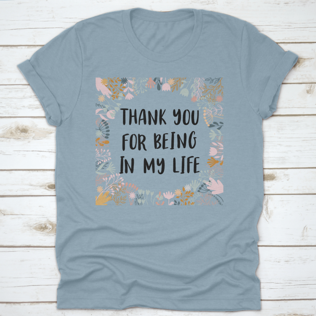 Blue T-shirt with gratitude message.
