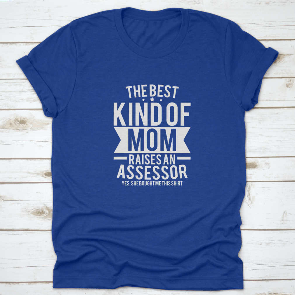 A stylish cotton shirt with the phrase 'The Best Kind Of Mom Raises An Assessor Yes, She Bought Me This Shirt' printed on it, showcasing a fun and loving message for mothers.