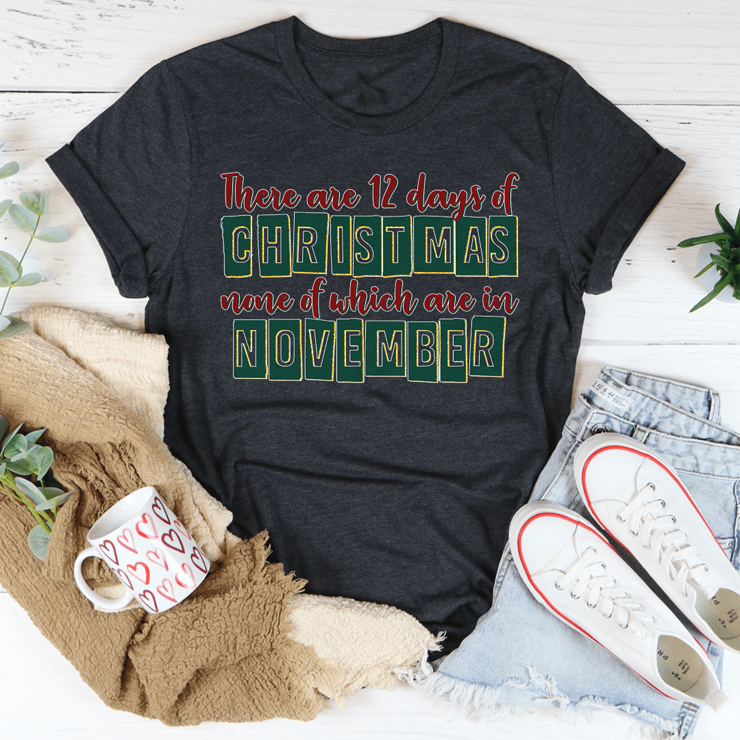 A festive 12 Days Until Christmas Tee made from 100% soft cotton, featuring a vibrant holiday-themed design.