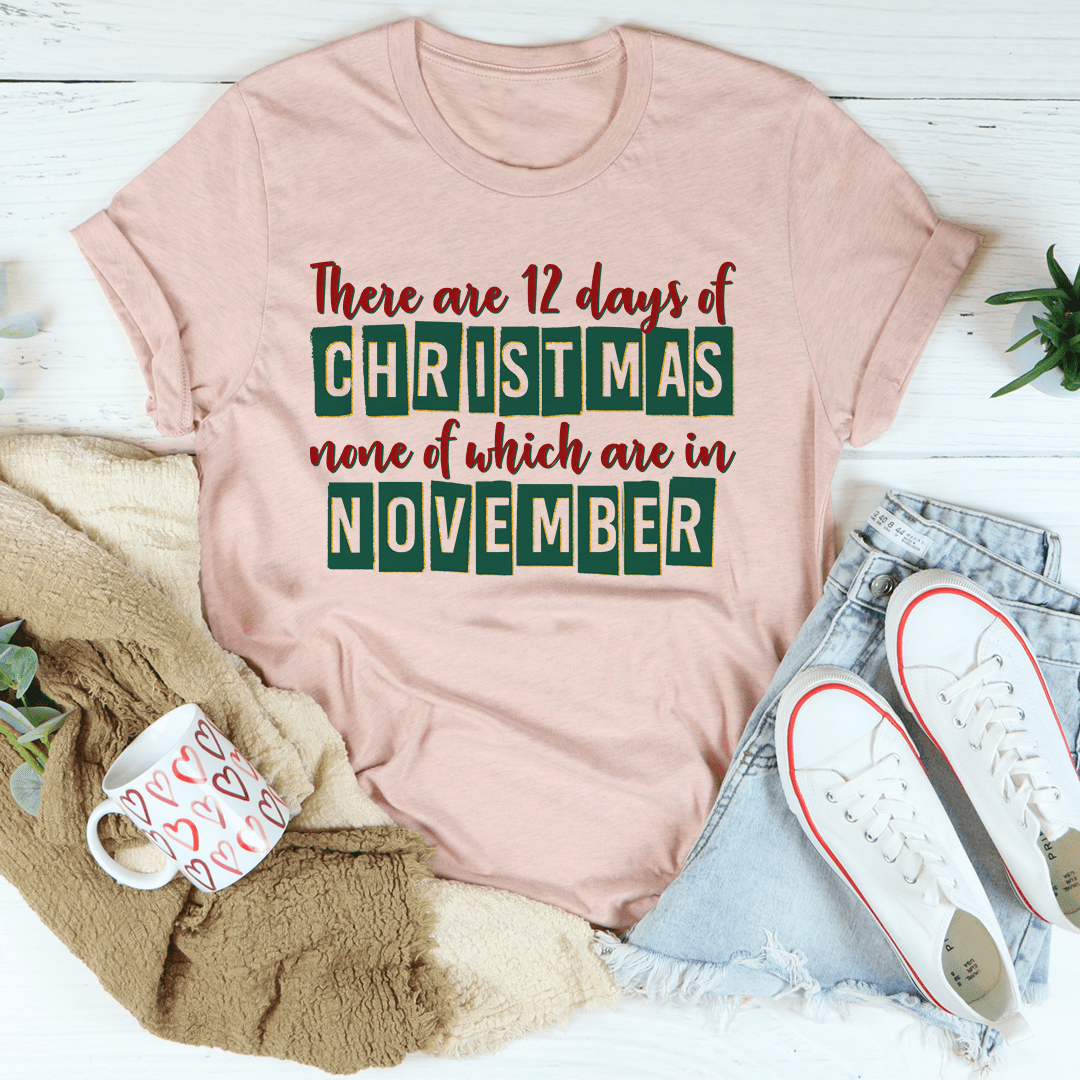 A festive 12 Days Until Christmas Tee made from 100% soft cotton, featuring a vibrant holiday-themed design.
