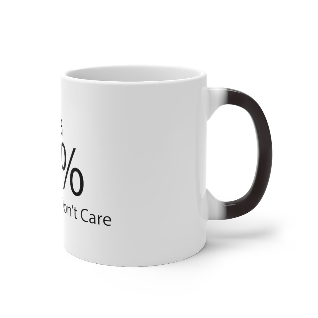 A white ceramic color changing mug with the phrase 'There is a 99% Chance I Don't Care' printed on it, showcasing its vibrant color transformation.
