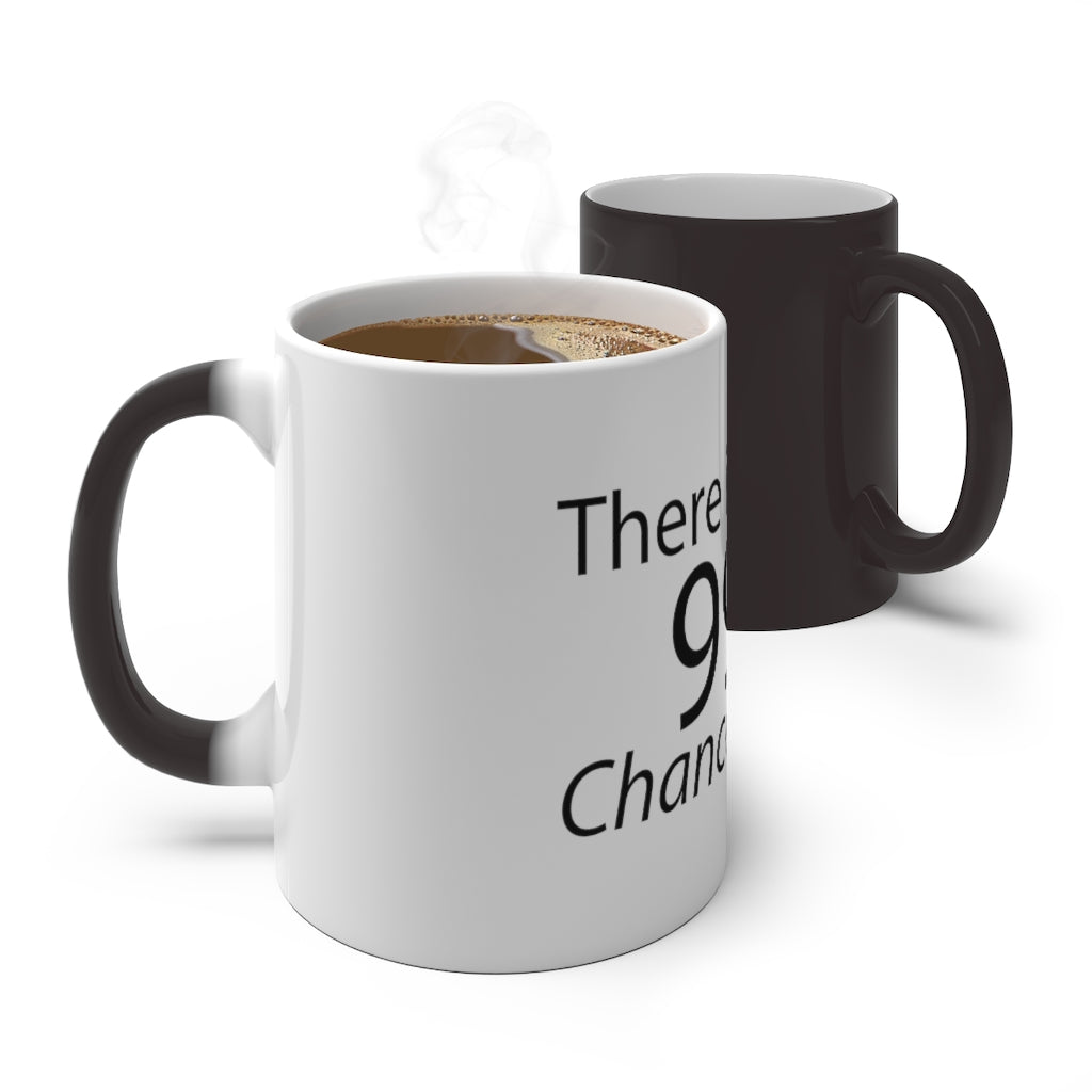 A white ceramic color changing mug with the phrase 'There is a 99% Chance I Don't Care' printed on it, showcasing its vibrant color transformation.