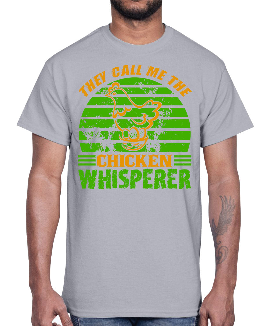 A comfortable cotton t-shirt featuring the phrase 'They Call Me the Chicken Whisperer', perfect for farm and garden lovers.
