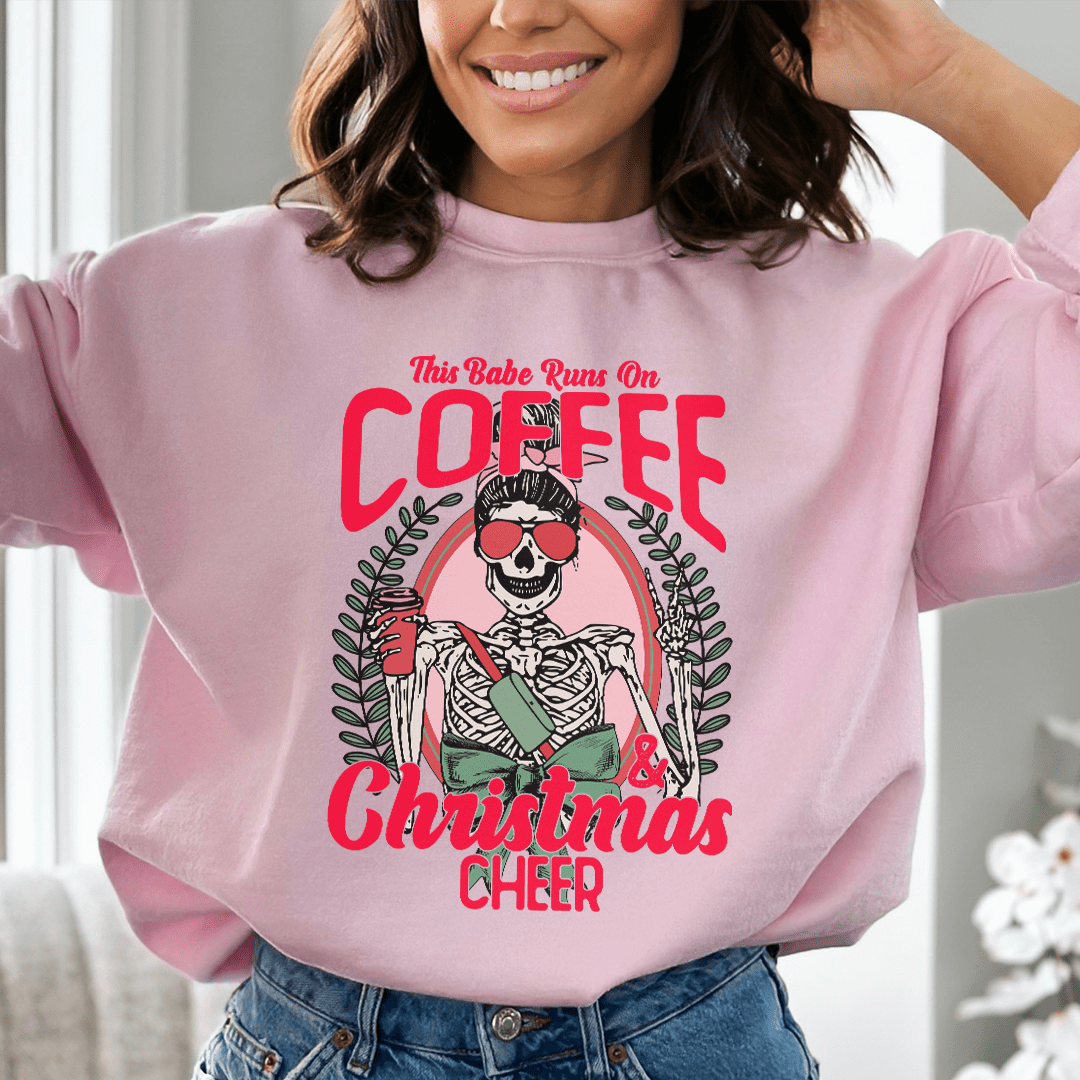 Cozy hoodie with festive design featuring coffee and Christmas cheer theme, perfect for winter wear.