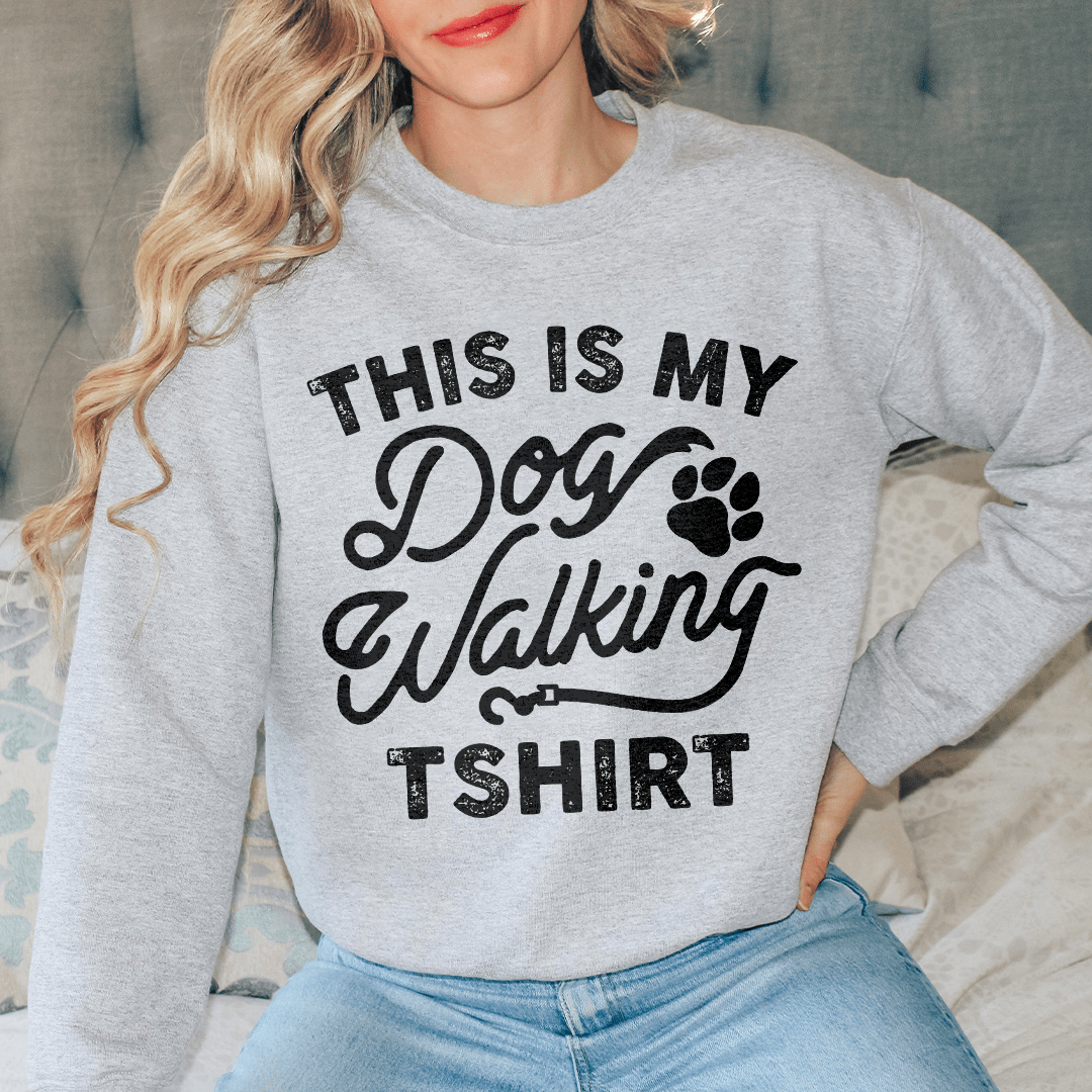 Cozy hoodie featuring a unique dog walking design, perfect for casual outings and dog lovers.