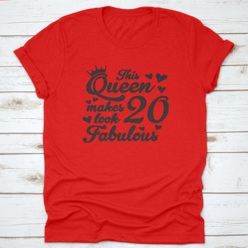 A stylish cotton t-shirt featuring the quote 'This Queen Makes 20 Look Fabulous', perfect for celebrating a 20th birthday.