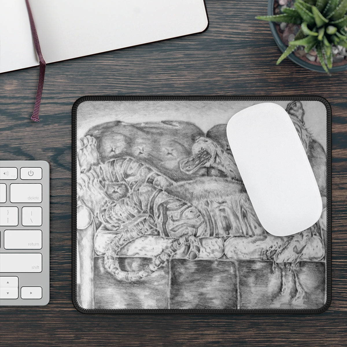 A vibrant gaming mouse pad featuring a tiger lounging on a couch, designed for smooth mouse movements and durability.