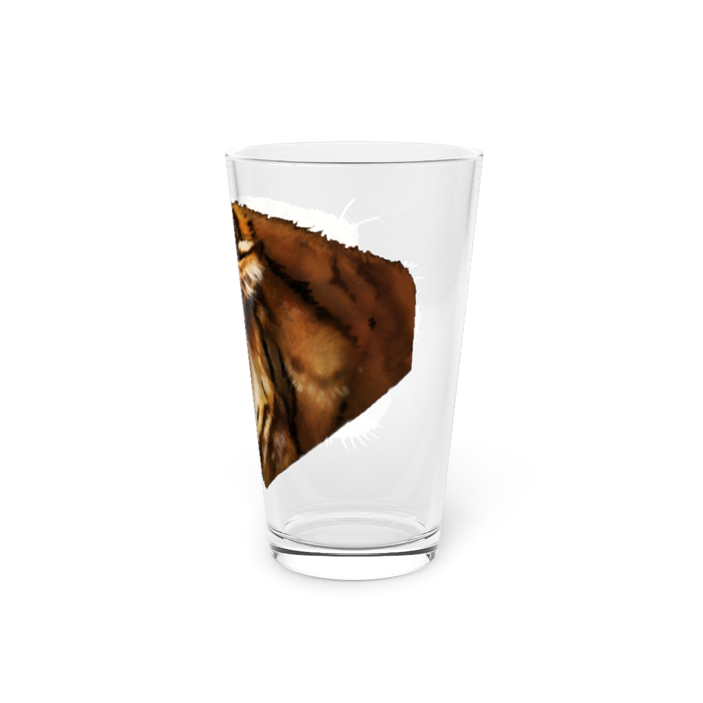 A clear 16oz Tiger Pint Glass showcasing its sleek design, perfect for personalized prints and various beverages.