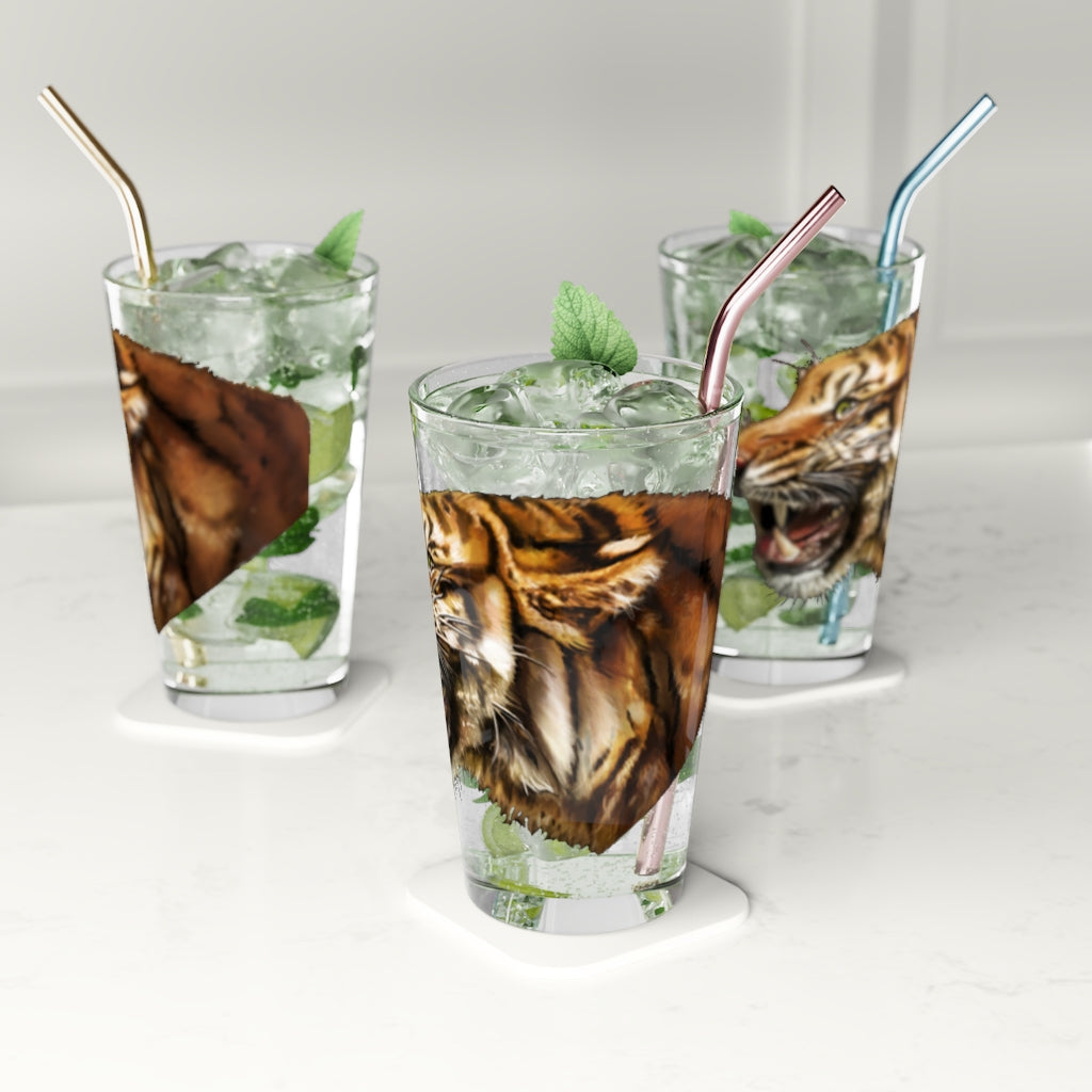 A clear 16oz Tiger Pint Glass showcasing its sleek design, perfect for personalized prints and various beverages.