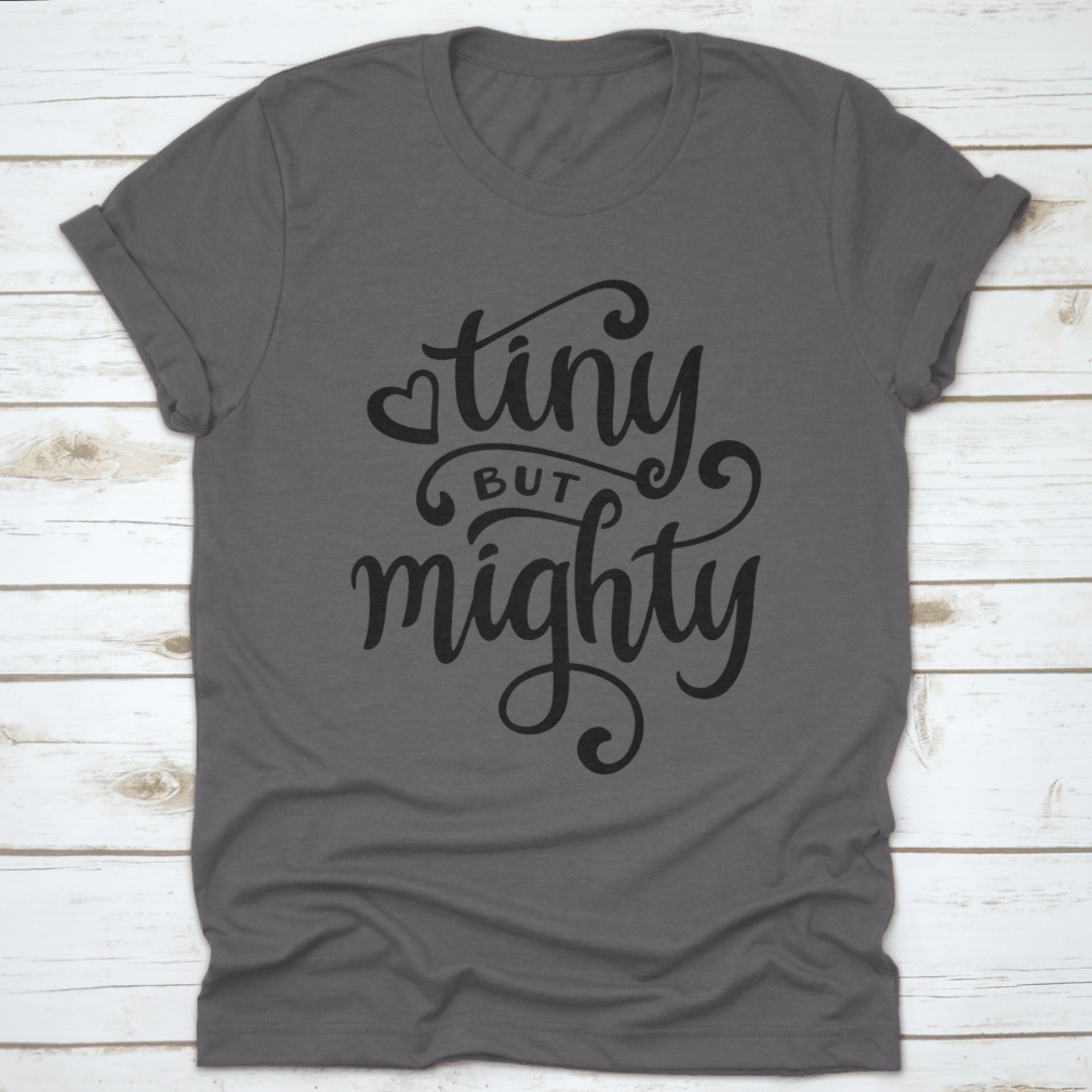 A stylish t-shirt featuring a hand-drawn calligraphy design, made from 100% cotton, showcasing its comfortable fit and artistic flair.