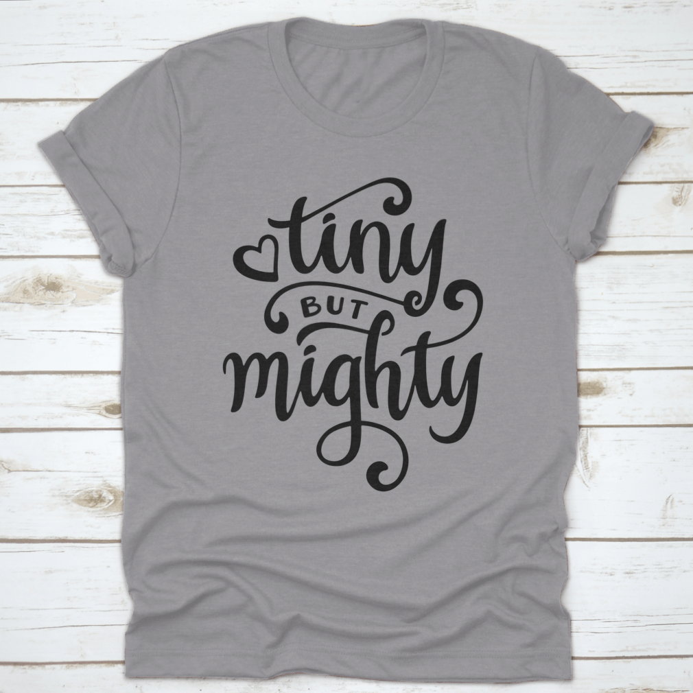 A stylish t-shirt featuring a hand-drawn calligraphy design, made from 100% cotton, showcasing its comfortable fit and artistic flair.