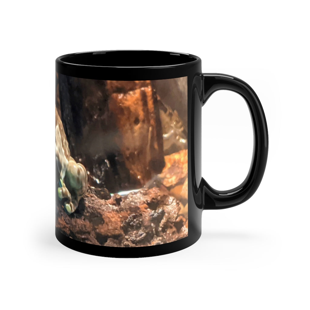 Toad 11oz black ceramic mug with a C-handle, perfect for coffee, tea, or hot chocolate, showcasing customizable designs.