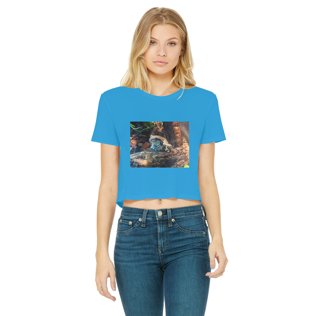 Toad Classic Women's Cropped Raw Edge T-Shirt in various colors, showcasing its stylish cropped design and raw edge hem.