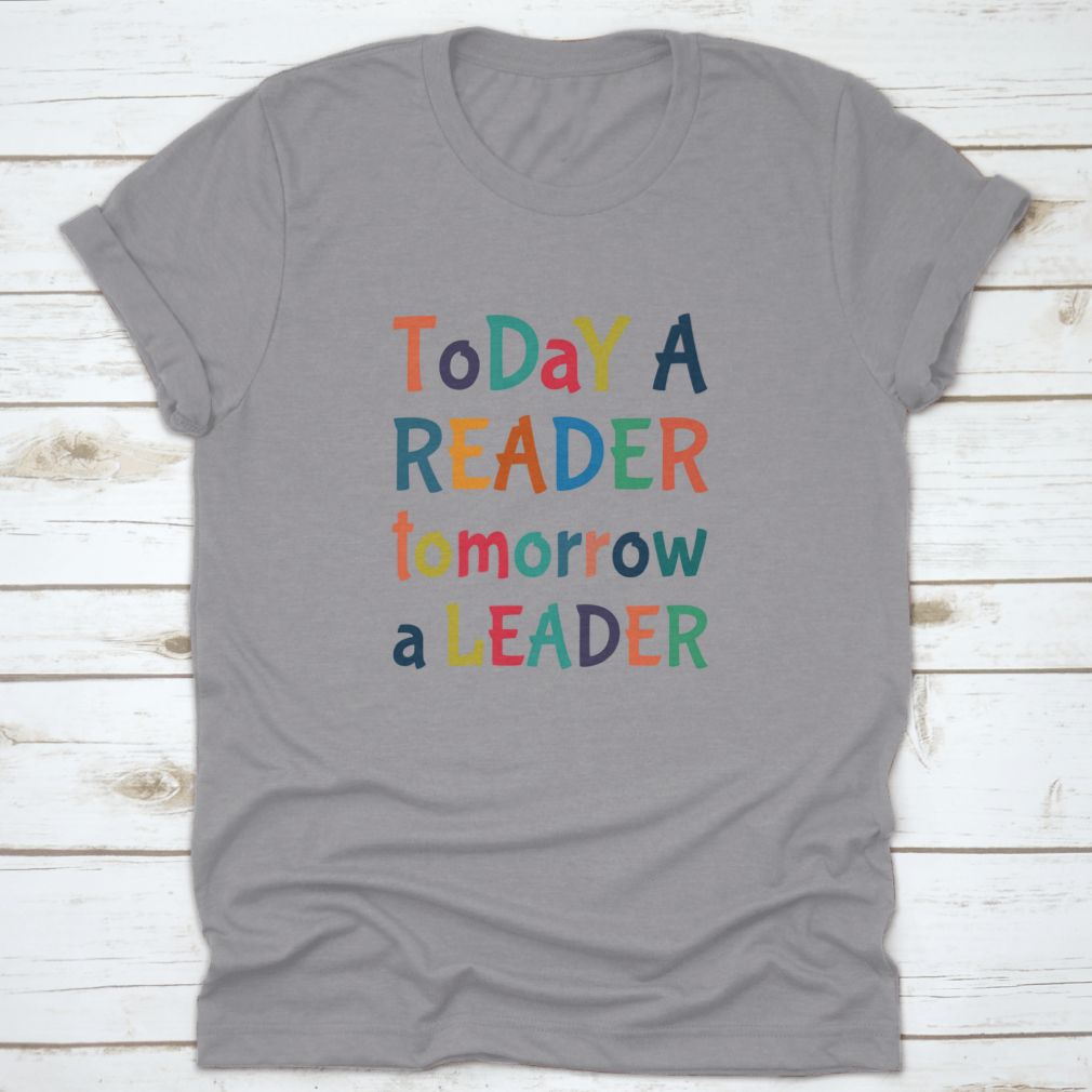 A comfortable Today A Reader, Tomorrow A Leader T-Shirt in various colors, showcasing its classic fit and inspirational design.