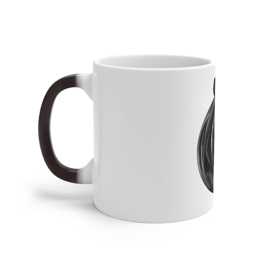 A white ceramic mug that changes color when filled with hot liquid, showcasing a fun and whimsical design.