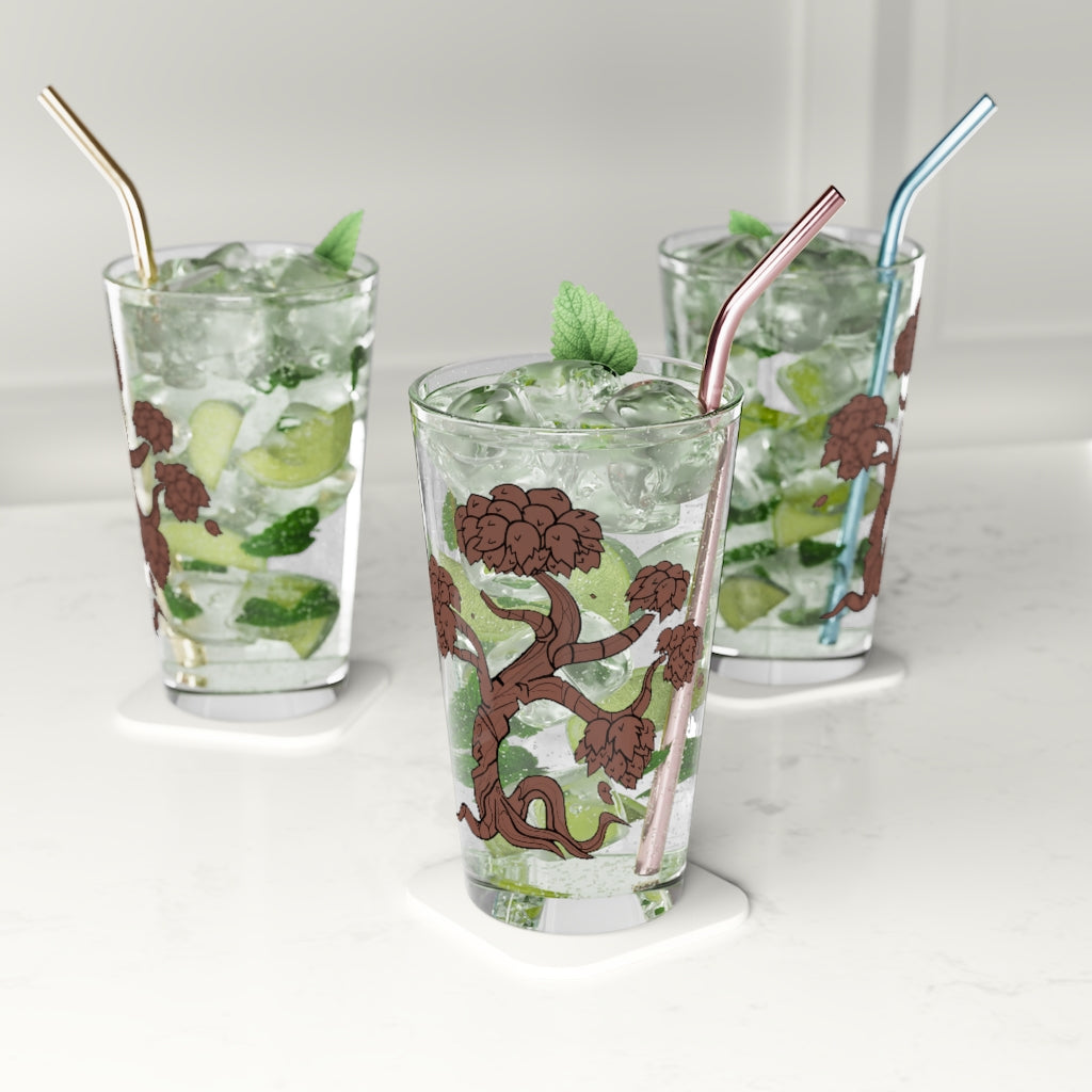 A clear 16oz Tree Pint Glass showcasing a customizable design, perfect for beverages and gifting.