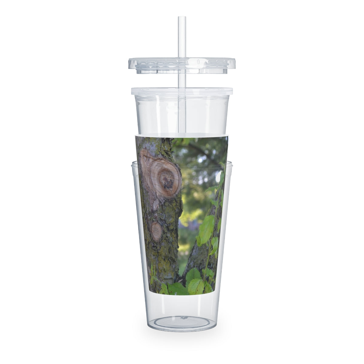 Tree Stump and Green Leaves Plastic Tumbler with Straw, featuring a nature-inspired design and a convenient lid and straw.