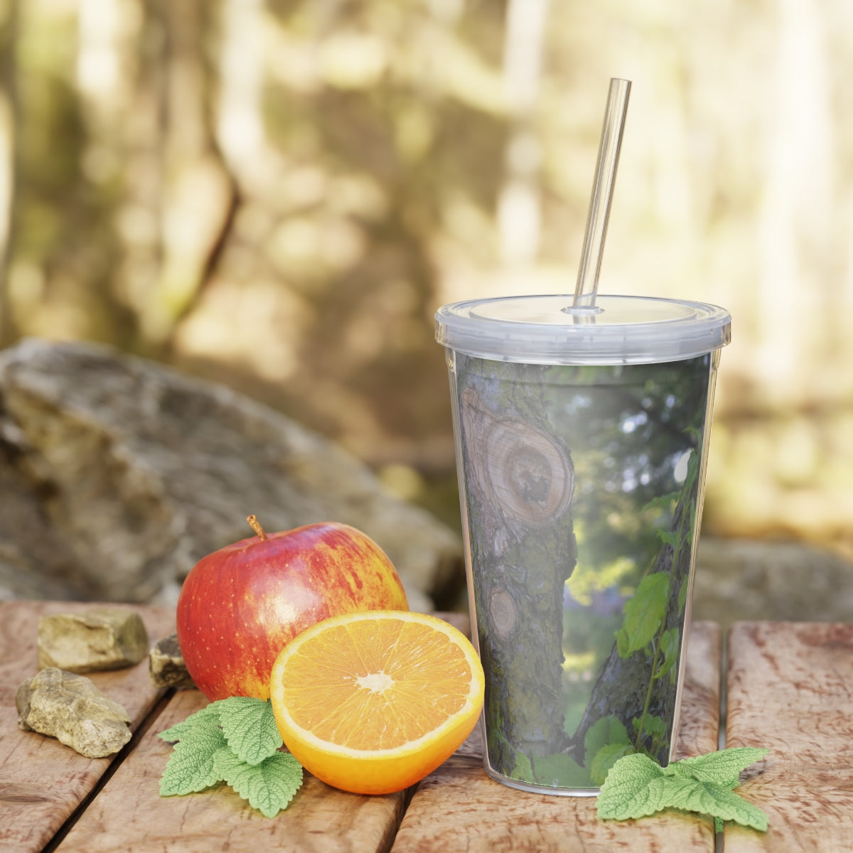 Tree Stump and Green Leaves Plastic Tumbler with Straw, featuring a nature-inspired design and a convenient lid and straw.