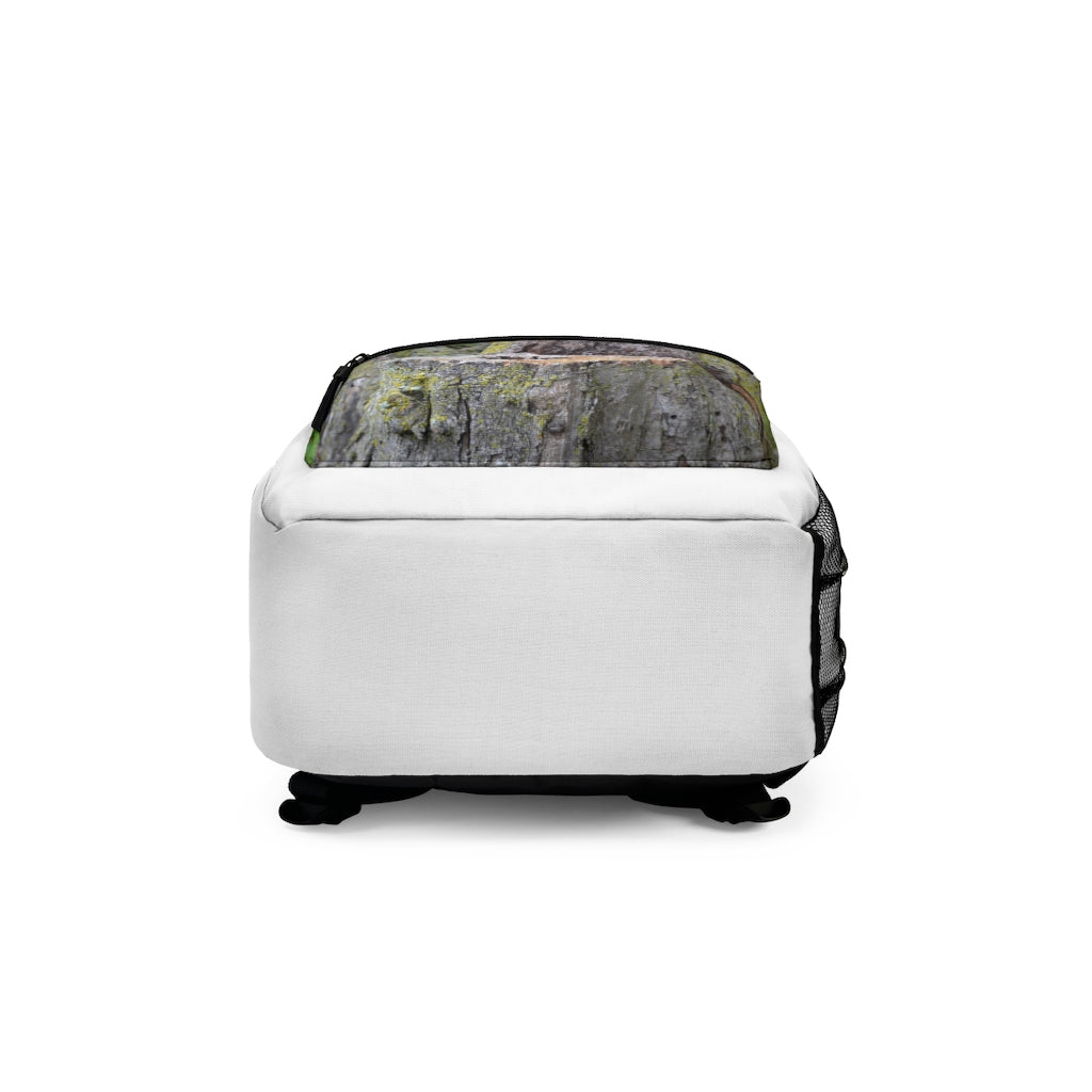 Tree Stump Backpack made from durable spun polyester, featuring adjustable straps and a custom name tag, perfect for outdoor adventures.