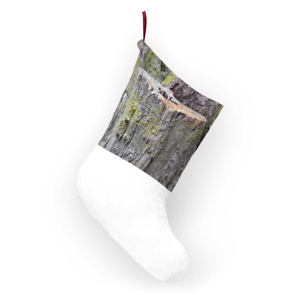 A cozy Tree Stump Christmas Stocking made of soft polyester fleece, featuring a festive design and a twill ribbon loop for hanging.