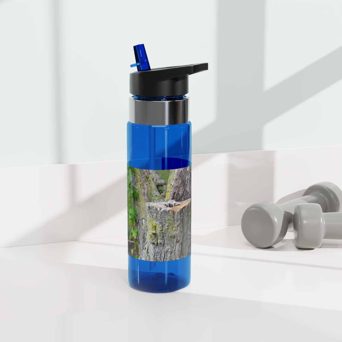 Tree Stump Kensington Tritan™ Sport Bottle in 20oz, featuring a screw-on lid, straw, and carabiner hook, made from durable BPA-free Tritan plastic.