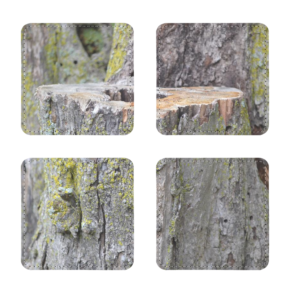 Pack of four Tree Stump Sublimation Coasters made from PU leather, featuring a white printable face and elegant white stitching.