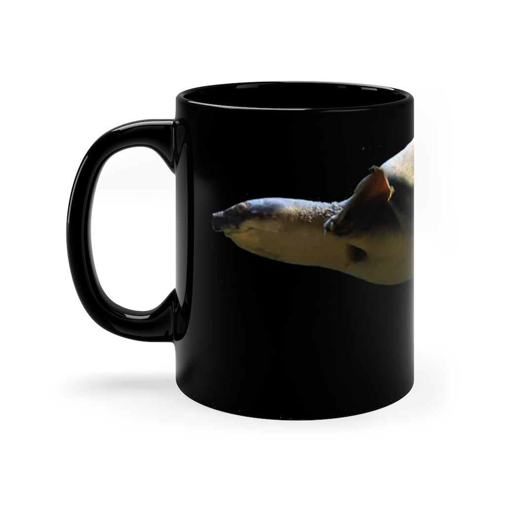 Turtle 11oz black ceramic mug with a sleek design and C-handle, perfect for coffee, tea, or hot chocolate.