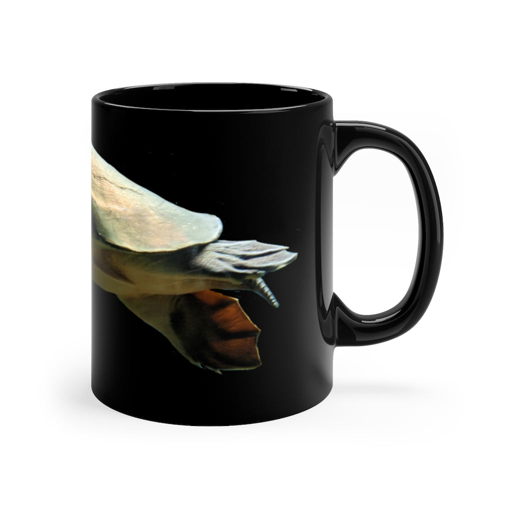 Turtle 11oz black ceramic mug with a sleek design and C-handle, perfect for coffee, tea, or hot chocolate.