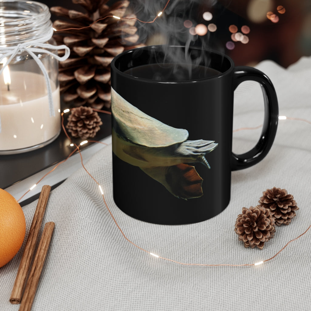 Turtle 11oz black ceramic mug with a sleek design and C-handle, perfect for coffee, tea, or hot chocolate.