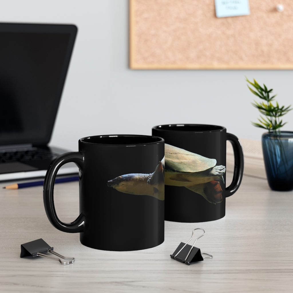 Turtle 11oz black ceramic mug with a sleek design and C-handle, perfect for coffee, tea, or hot chocolate.
