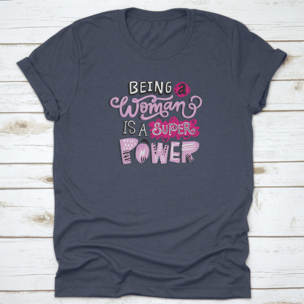 Unique hand-drawn lettering quote t-shirt featuring the phrase 'Being A Woman Is A', showcasing its stylish design and comfortable fit.