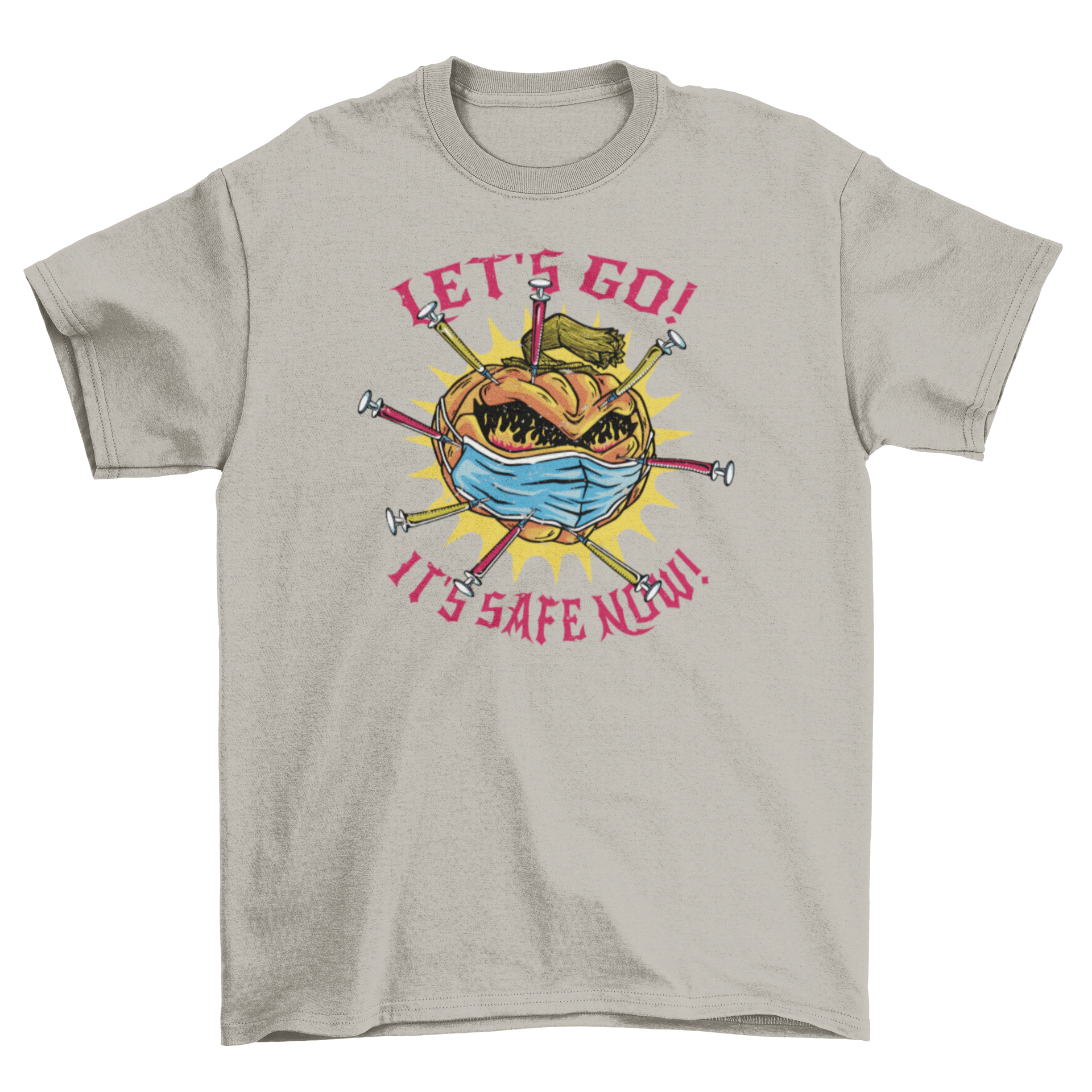 A vibrant t-shirt featuring a pumpkin wearing a face mask and vaccines, with the quote 'Let's go! It's safe now!' printed below.