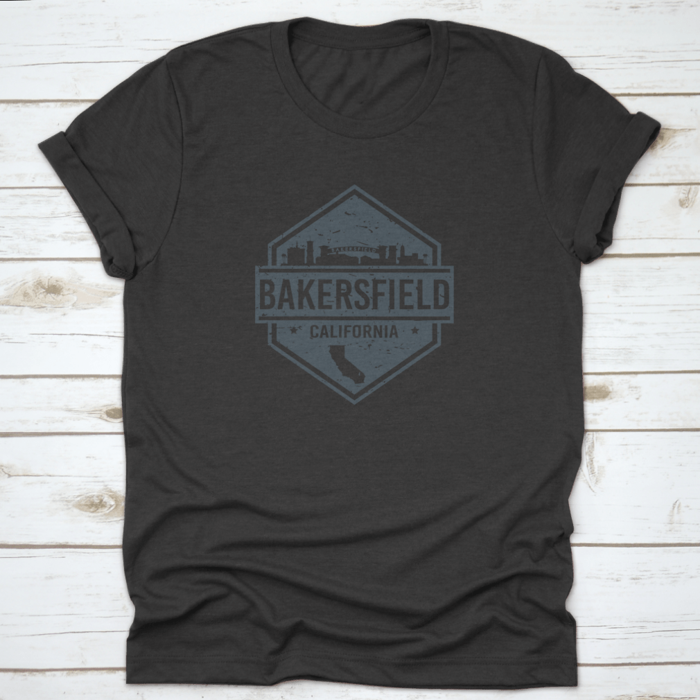 Vector illustration of the grunge skyline of Bakersfield, California, displayed on a comfortable cotton t-shirt.