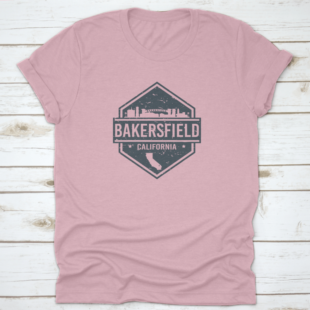 Vector illustration of the grunge skyline of Bakersfield, California, displayed on a comfortable cotton t-shirt.