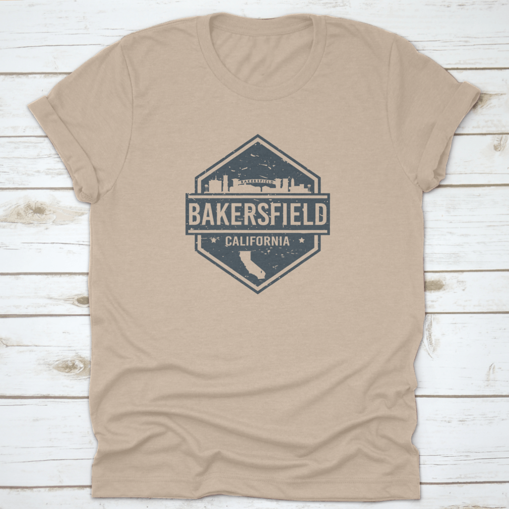 Vector illustration of the grunge skyline of Bakersfield, California, displayed on a comfortable cotton t-shirt.