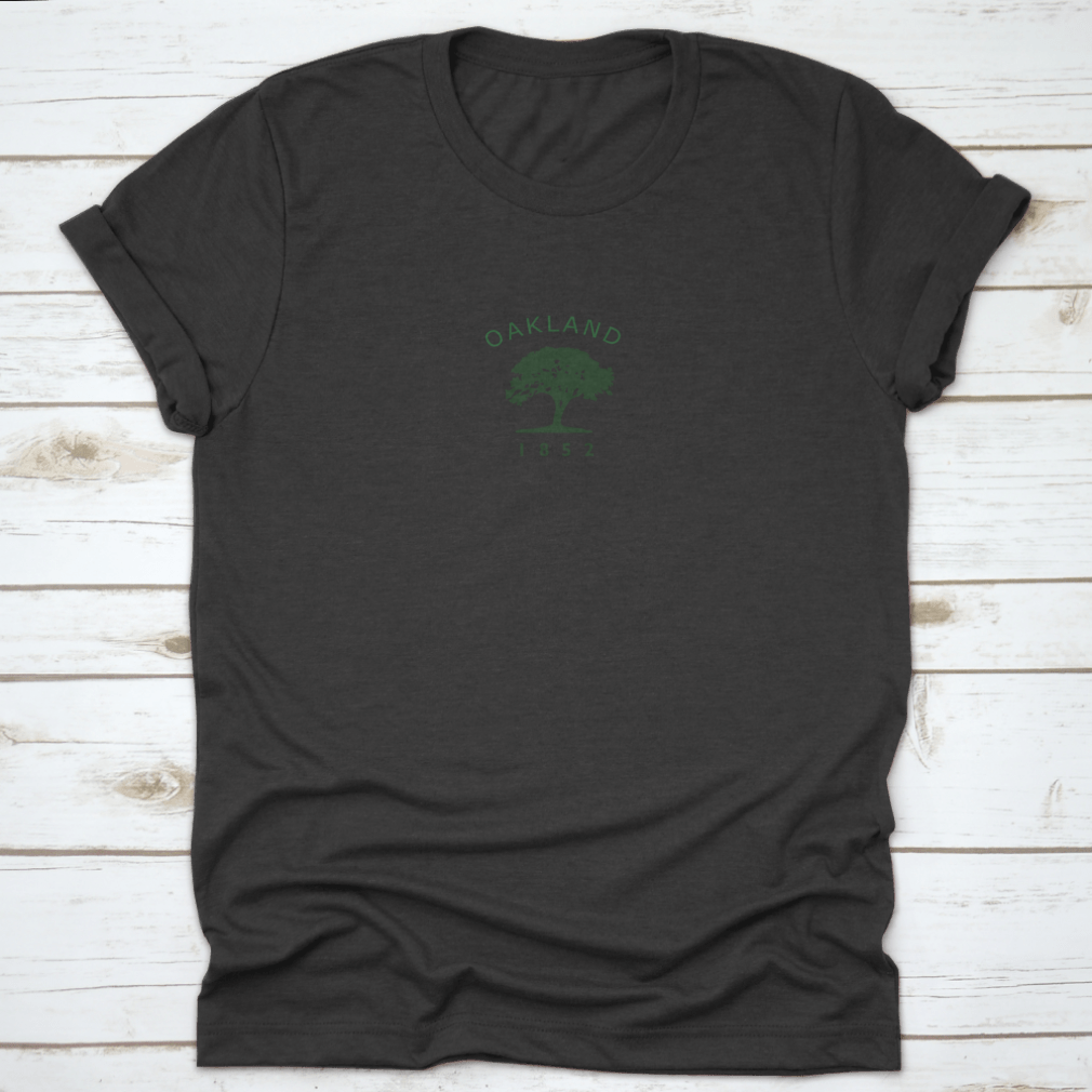Vintage 1852 Oakland Flag T-shirt featuring an oak tree logo, showcasing a classic design on a comfortable cotton fabric.
