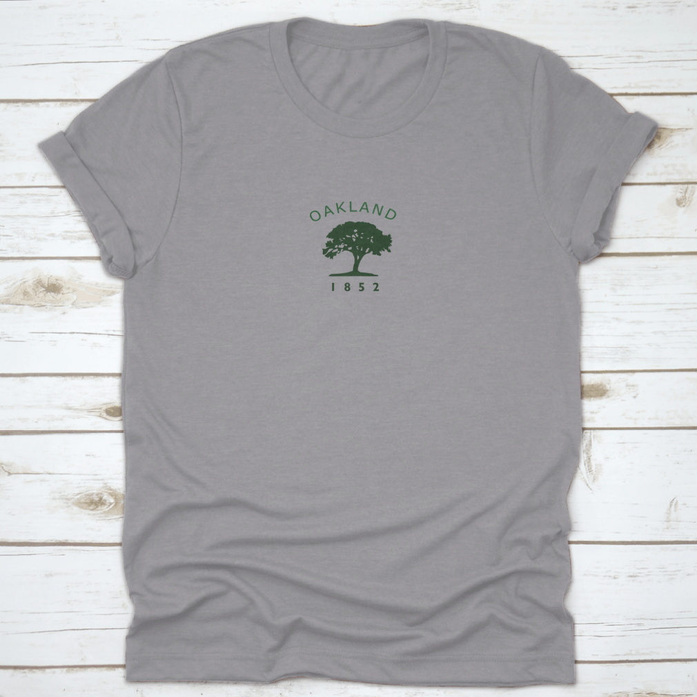 Vintage 1852 Oakland Flag T-shirt featuring an oak tree logo, showcasing a classic design on a comfortable cotton fabric.