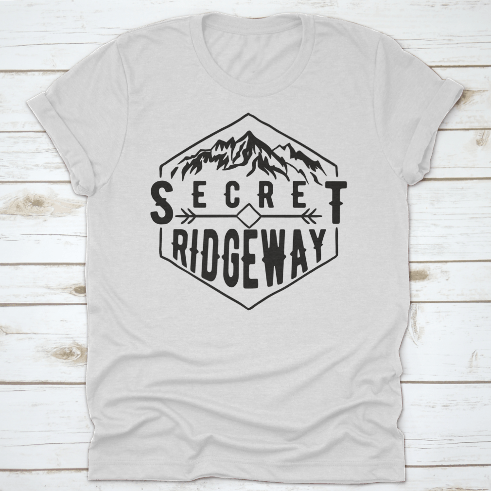 A stylish Wanderlust graphic tee featuring a mountain print, made from soft cotton fabric, perfect for outdoor enthusiasts.