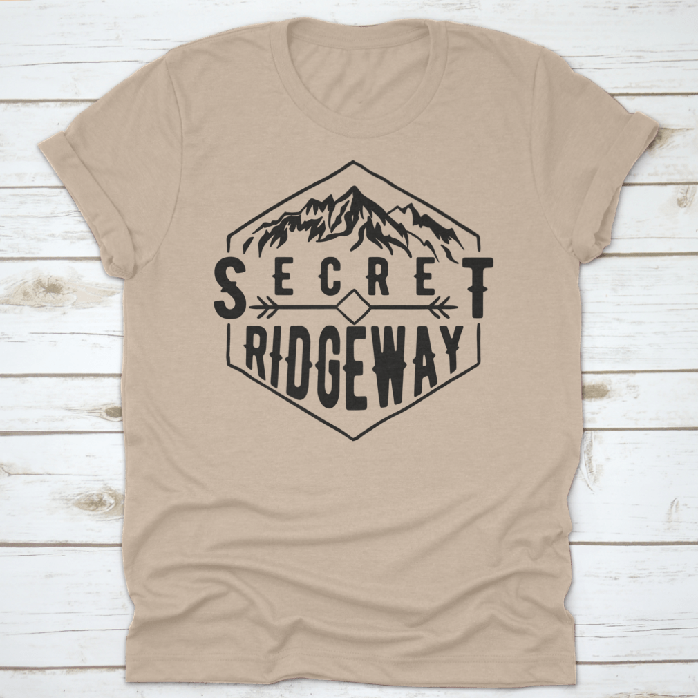 A stylish Wanderlust graphic tee featuring a mountain print, made from soft cotton fabric, perfect for outdoor enthusiasts.